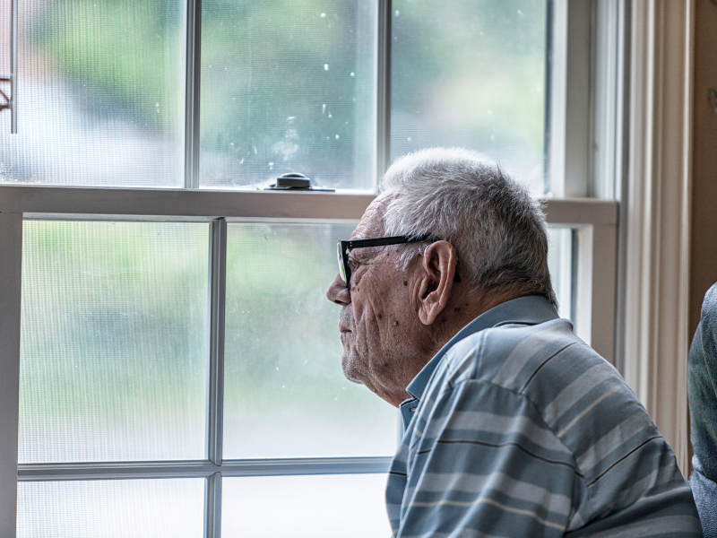 Blog Headers (19) elderly man looking out the window