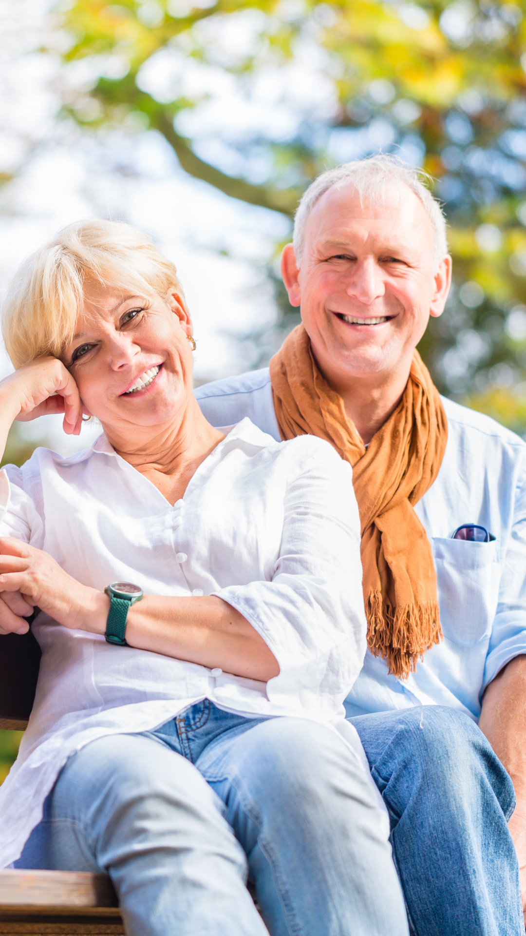 elderly man and woman similing