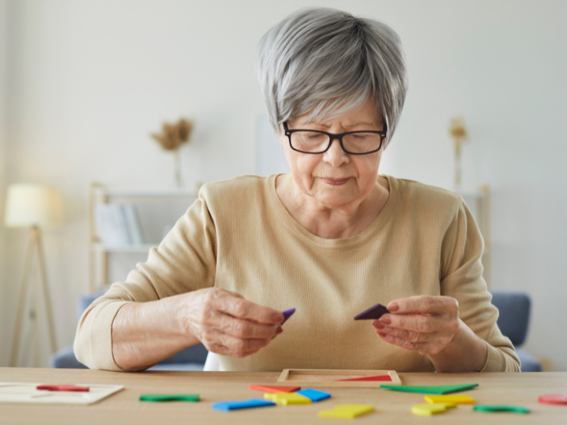 senior doing a puzle