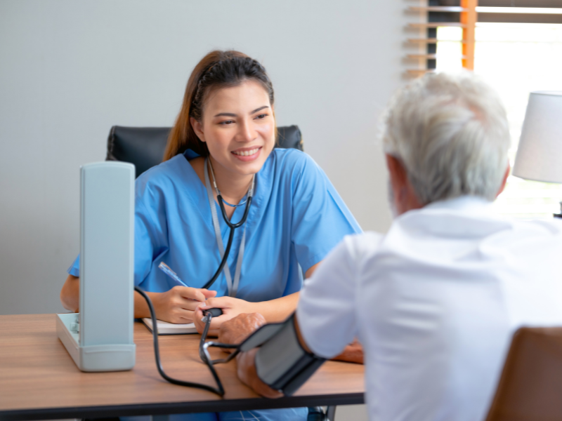 senior speaking to caregiver