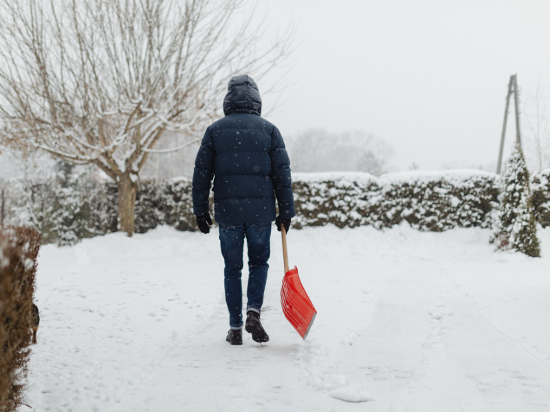 man shoveling