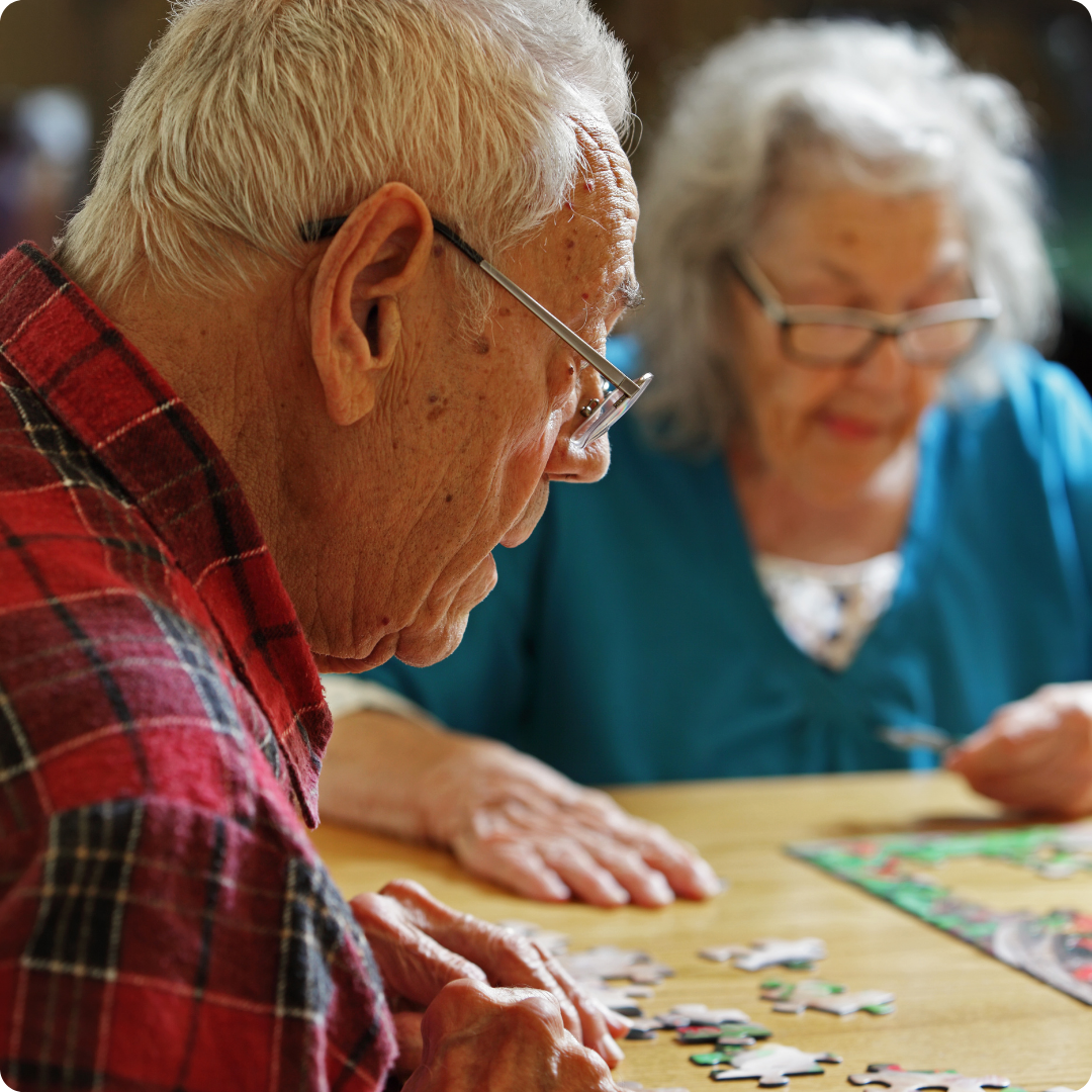 senior using a puzzle