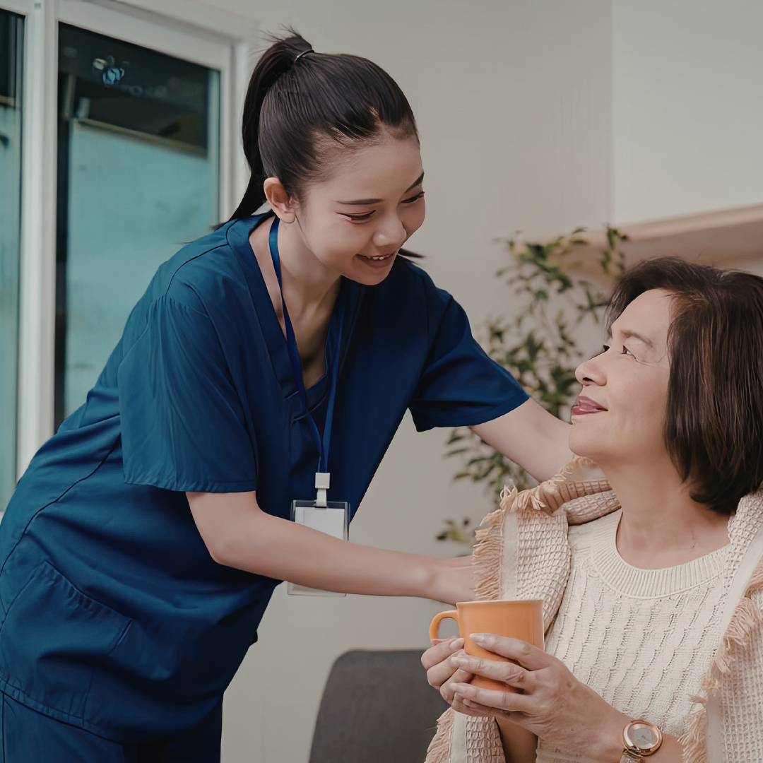 caregiver supporting Parkinson's home safety by assisting with mobility and fall prevention with Ideal Caregivers 4U