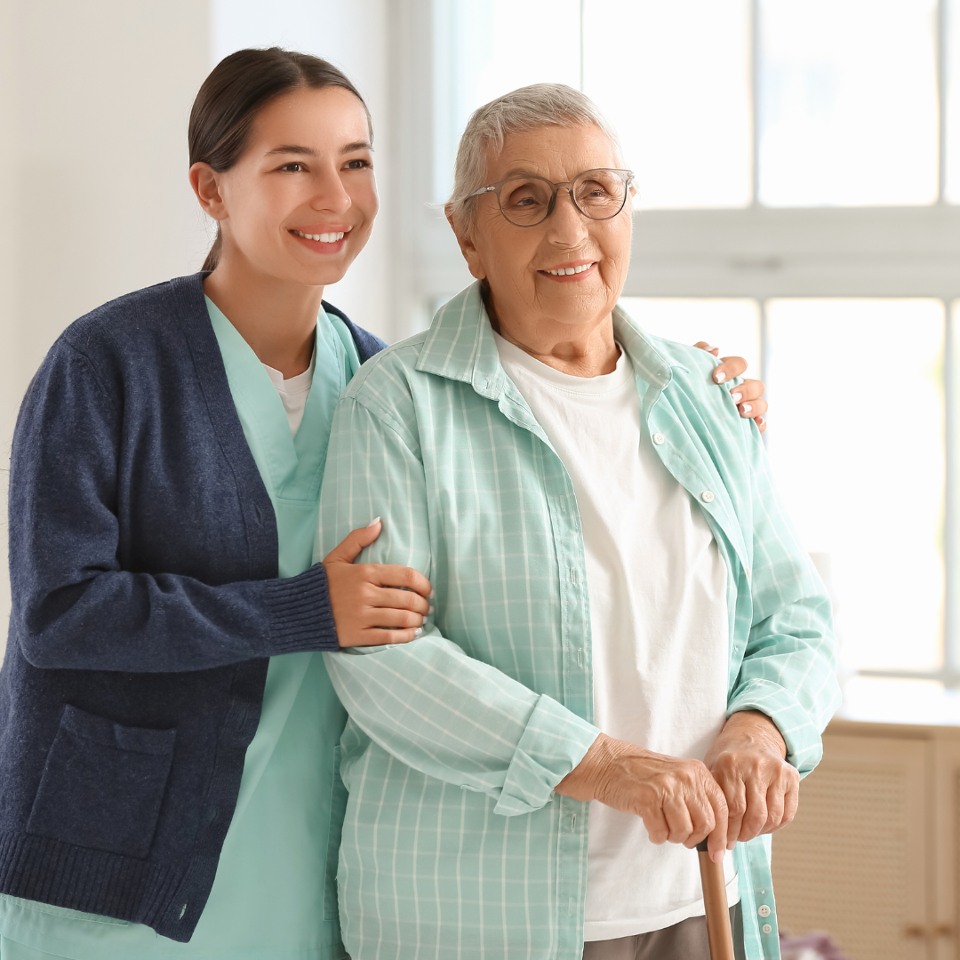 Caregiver assisting senior woman