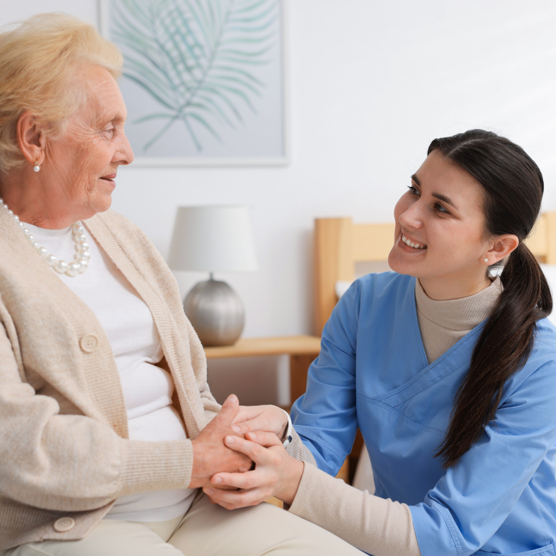 Adult daughter talking to senior mother
